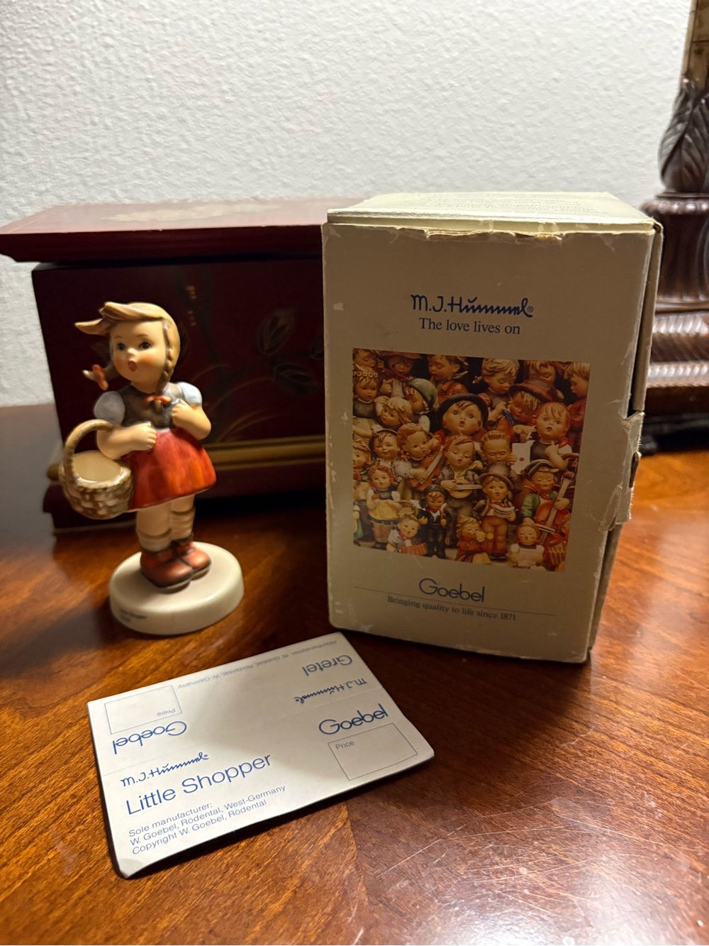 Goebel Little Shopper Figurine in Red and Cream
